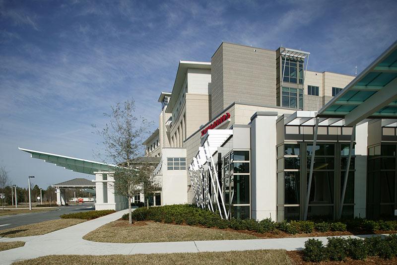 Exterior photo of emergency room entrance and building architecture at Baptist Medical Center South